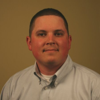 alex mordach headshot